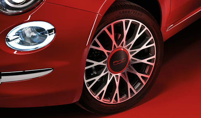 15’’ steel wheel with (RED) logo on wheel’s hubcap 